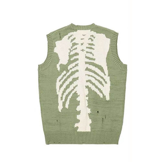 Pull vert avec motif de squelette