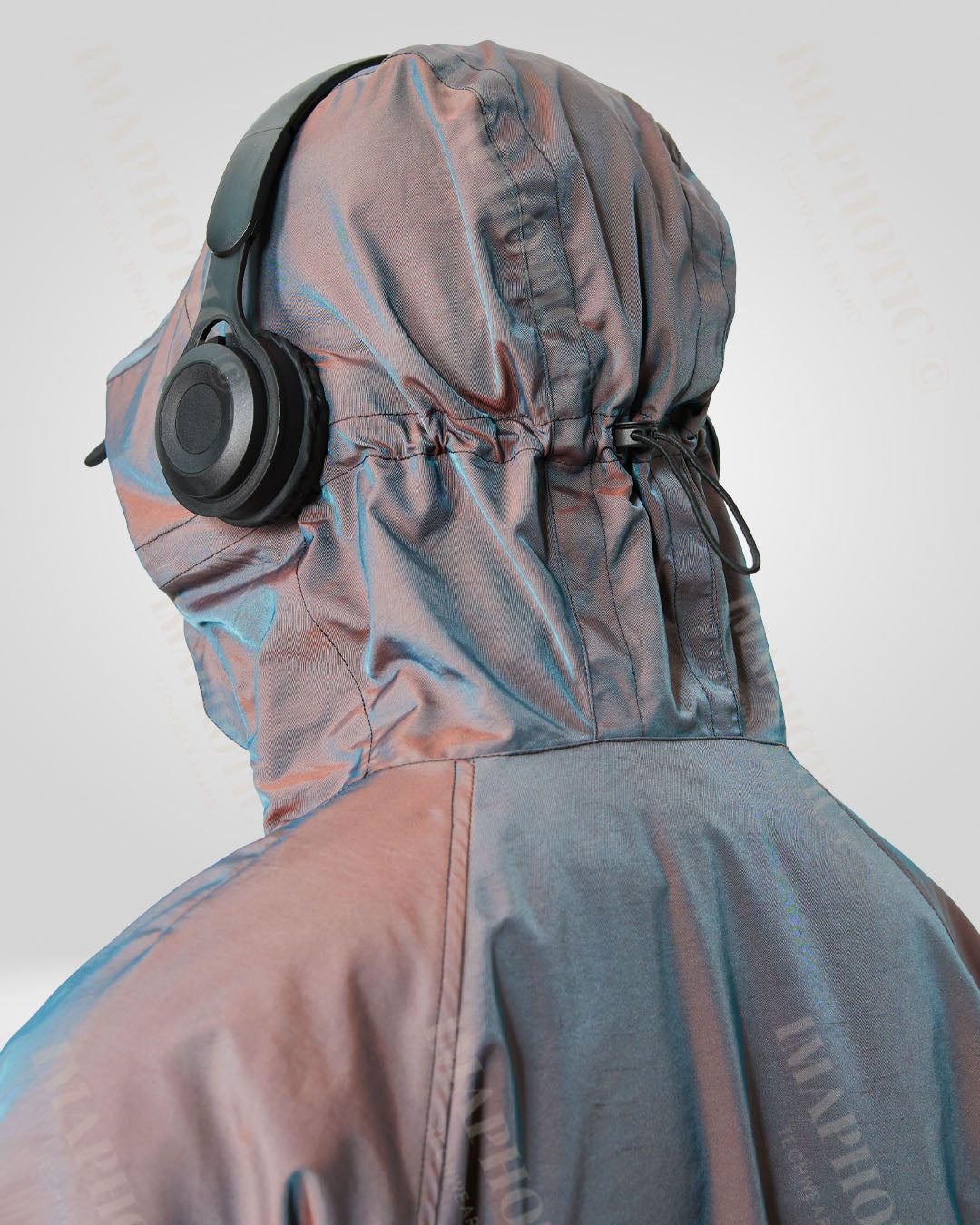 Veste coupe-vent à capuche transformable