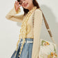Sac brodé de tournesol chic