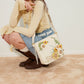 Sac brodé de tournesol chic