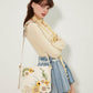 Sac brodé de tournesol chic