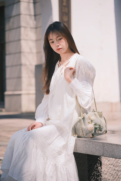 Sac seau à motifs floraux et papillons