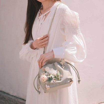 Sac seau à motifs floraux et papillons