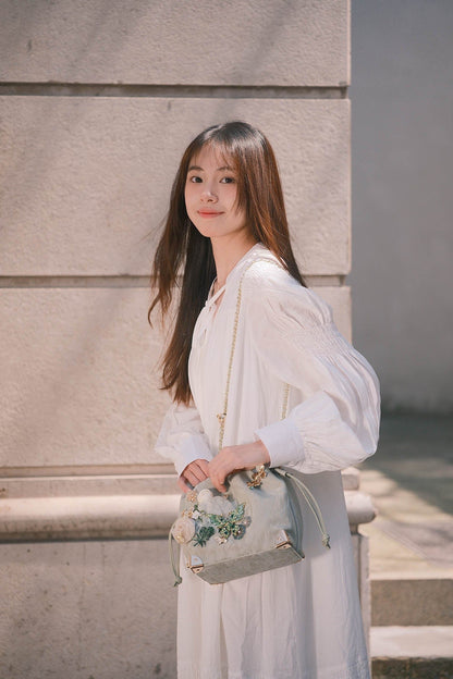 Sac seau à motifs floraux et papillons