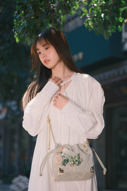 Sac seau à motifs floraux et papillons