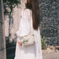 Sac seau à motifs floraux et papillons