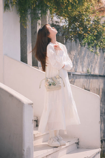 Sac seau à motifs floraux et papillons