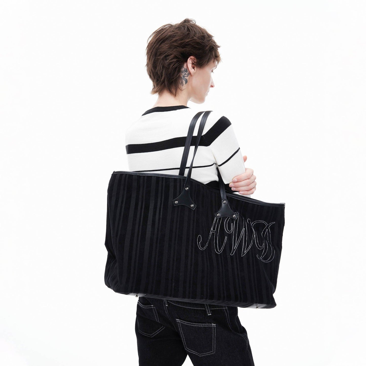 Sac en velours côtelé et cuir élégant