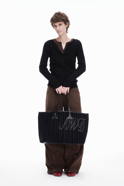 Sac en velours côtelé et cuir élégant