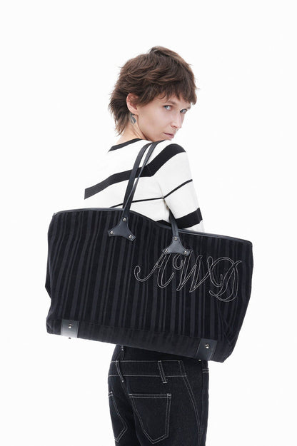 Sac en velours côtelé et cuir élégant