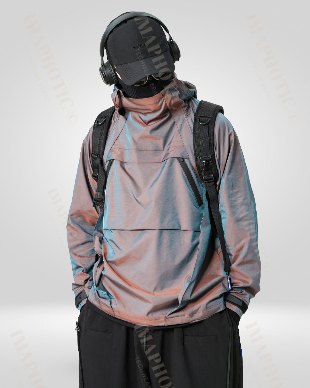 Veste coupe-vent à capuche transformable