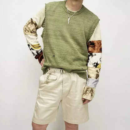 Pull vert avec motif de squelette