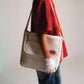 Sac bandoulière chic prêt pour l'aventure