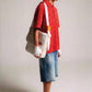 Sac bandoulière chic prêt pour l'aventure