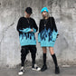 Pull en tricot bleu flamme