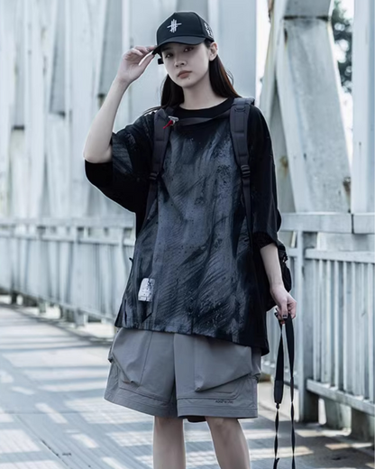 T-shirt graphique coloré en tie-dye