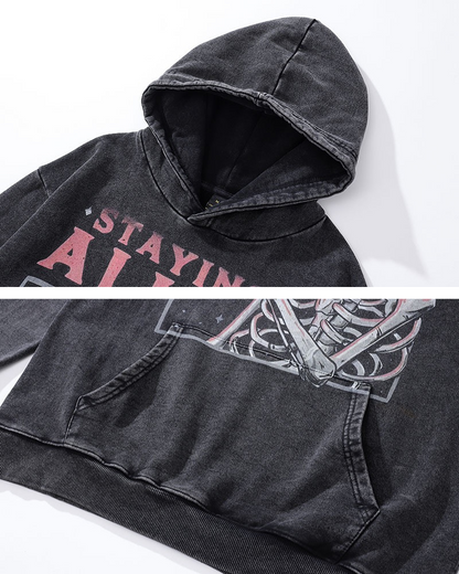 “Sweat à capuche graphique crâne tendance”