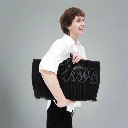 Sac en velours côtelé et cuir élégant