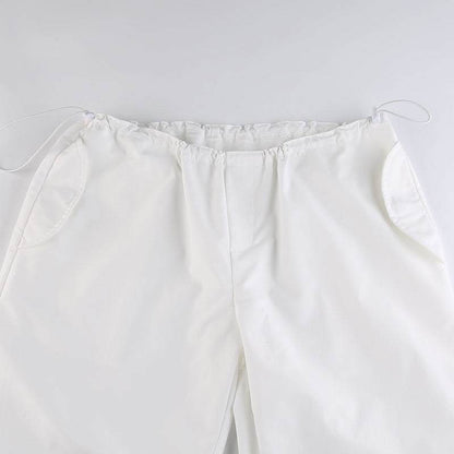 Pantalons parachute blancs -  tenue streetwear - Pantalons parachute blancs pour un style streetwear