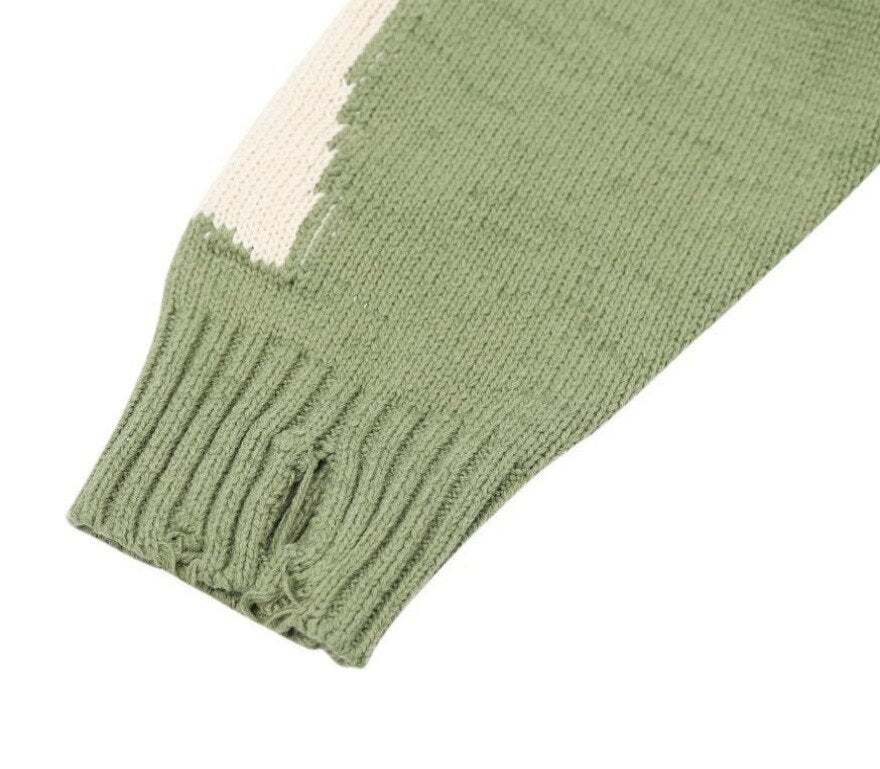 Pull vert avec motif de squelette -  look tendance - Pull vert à motif de squelette pour un look unique